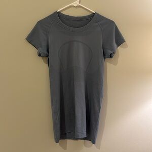 Lululemon swiftly tech shirt in light blue; size 8